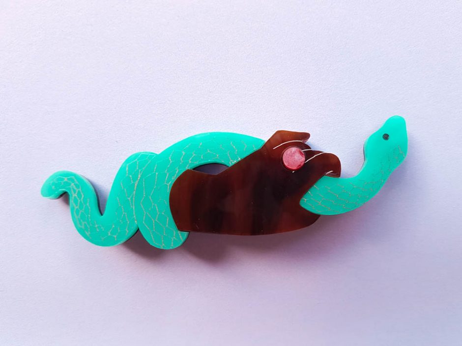 Fancy Hand Holding a Snake Brooch